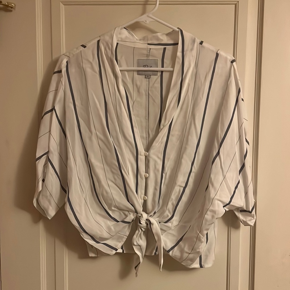 Beautiful blouse. White with blue stripes size S. 3 buttons with a tie bottom.